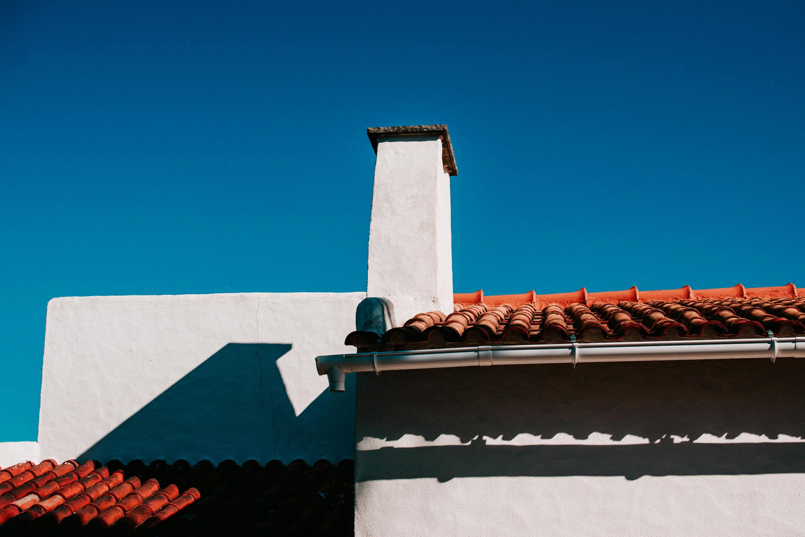 Low Angle Shot of Whitewashed Building